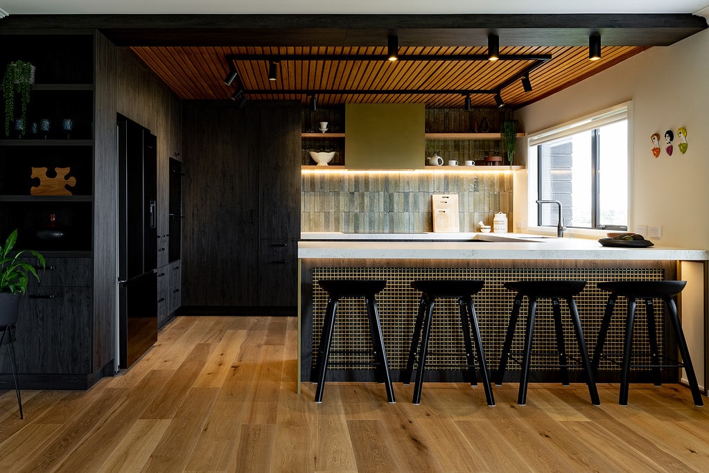 Dark Mixed Material Kitchen by Yellowfox Interior Design Studio